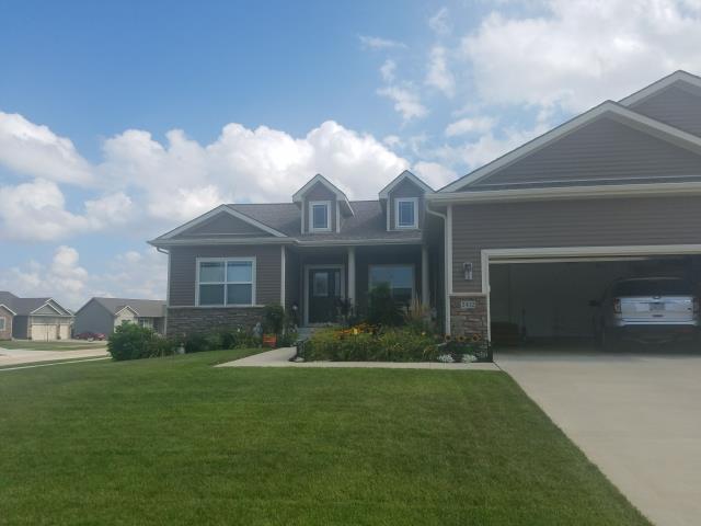 We completed a comprehensive roofing overhaul on this Grimes, IA home, replacing all existing shingles and gutters. Our team ensured a seamless, high-quality finish, enhancing the home's curb appeal and protection.