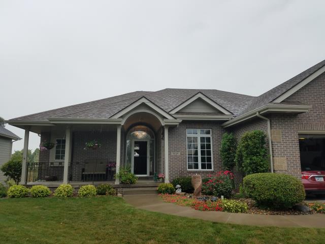 We replaced the entire roof on this Johnston, IA home and repaired a significant section of the gutter system, ensuring lasting durability and improved water flow