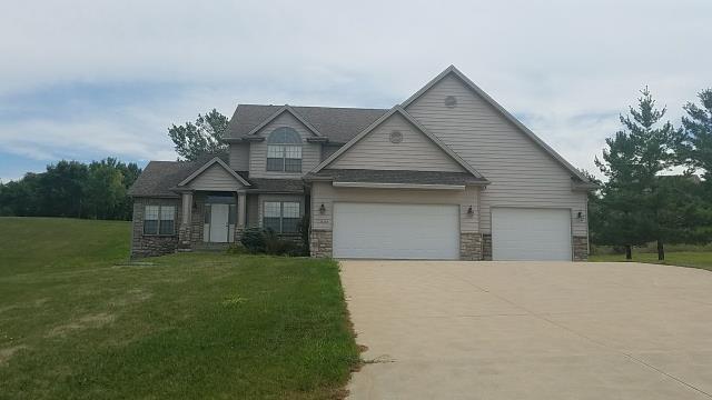 We replaced the entire roof, installed new gutters, and repaired a significant section of the siding on this Grimes, IA home, ensuring lasting protection, improved water drainage, and enhanced curb appeal.