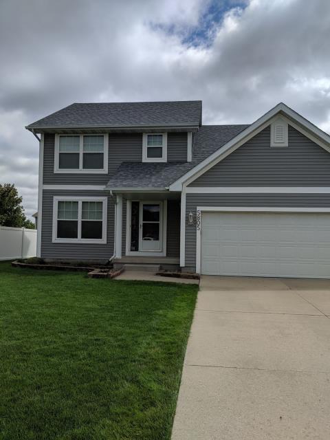 We completed a comprehensive roofing replacement on this Johnston, Iowa home, removing the old shingles and installing high-quality new materials for lasting durability, protection, and improved curb appeal.