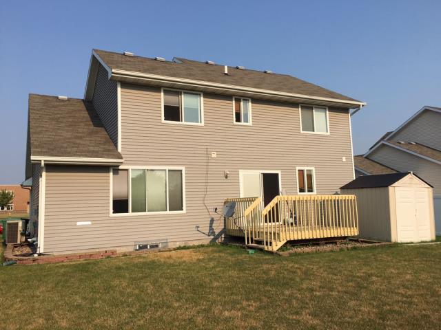 We completed a comprehensive roofing replacement on this Johnston, Iowa home, removing the old shingles and installing high-quality new materials for lasting durability, protection, and improved curb appeal.