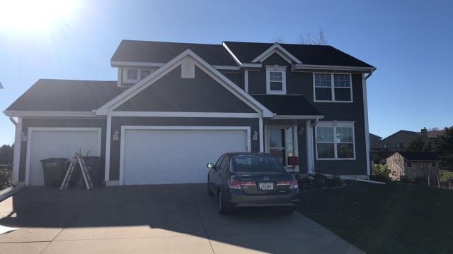 We replaced the entire roof, installed new siding, and added seamless gutters to this Grimes, Iowa home, improving durability, protection, and overall curb appeal.