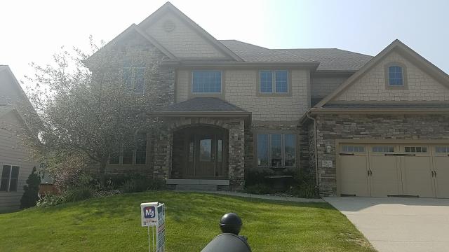 We completely replaced the old roofing with new, high-quality materials and installed fresh gutters on this Johnston, IA home, ensuring optimal water drainage, lasting durability, and reliable protection.