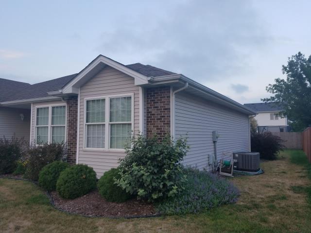 We completed a comprehensive roofing overhaul on this Grimes, IA home, replacing all shingles and gutters. The new system ensures lasting durability and improved water drainage, enhancing the home's overall protection.