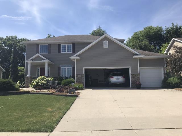 Completed a comprehensive roofing overhaul in Johnston, IA, including the removal of old shingles, installation of new, high-quality shingles, and replacement of all gutters to ensure optimal drainage and lasting protection.