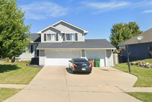 We replaced all gutters, installed new downspouts, and repaired the roof on this home in Bondurant, IA, ensuring optimal water flow and reliable protection against leaks.