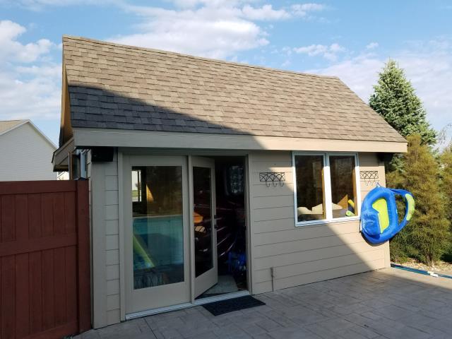 We completed a comprehensive project on this home in Bondurant, IA, replacing the entire roof on both the house and pool shed. Additionally, we repaired the siding and installed new gutters on the house, enhancing the home's protection and overall appearance.