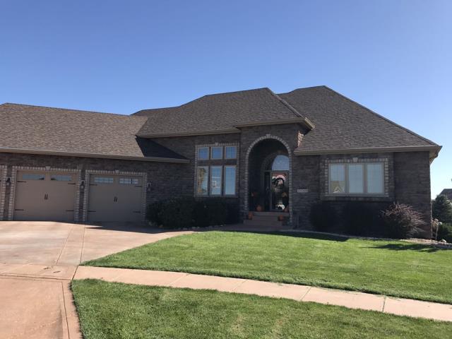 We completed a comprehensive project on this home in Bondurant, IA, replacing the entire roof on both the house and pool shed. Additionally, we repaired the siding and installed new gutters on the house, enhancing the home's protection and overall appearance.