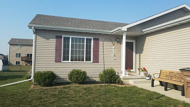We completely replaced the old roof with new, high-quality materials and repaired the siding in Bondurant, IA, ensuring a flawless finish.