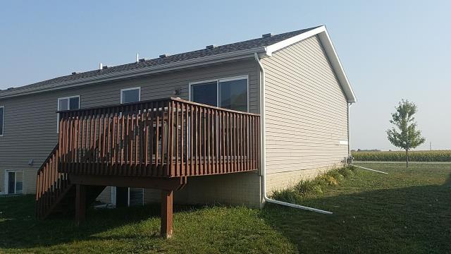 We completely replaced the old roof with new, high-quality materials and repaired the siding in Bondurant, IA, ensuring a flawless finish.