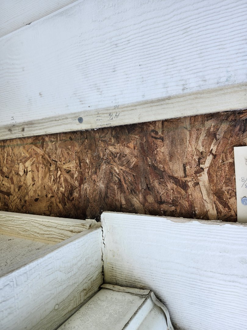 Provided the next year inspection prosiding to a homeowner. In walki, water was identified on the OSB. In the lower basement, we removed 2 pieces of siding on the exterior under both windows on the 1st floor and the 2nd floor water damage was identified to the plywood. The no house wrap was on the home. It is our recommendation that replacing of the siding o s b install a new house wrap, new window tape, new o s b is what is recommended