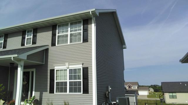 We installed a new roof in Van Meter, IA, ensuring durability and energy efficiency. Additionally, we repaired the siding to restore the home's exterior integrity and appearance.