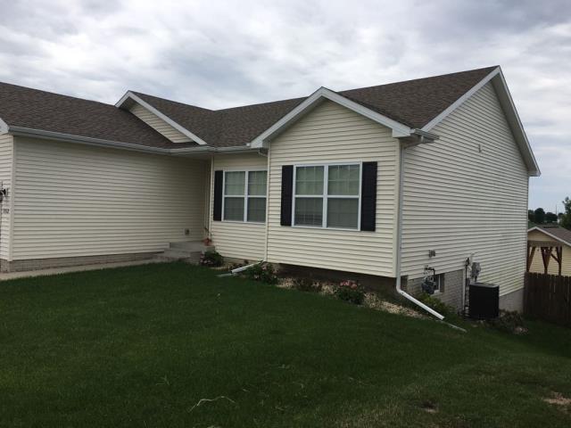 We replaced the entire roof in Johnston, IA, removing old shingles, installing new underlayment, and applying premium-quality roofing materials for durability and aesthetics.