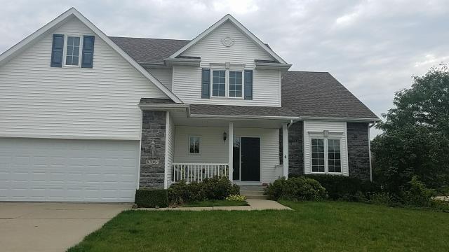 We completed a comprehensive roofing overhaul in Johnston, IA, installing new shingles and gutters. The old roof was removed, and the new materials were carefully installed to ensure durability and efficiency.