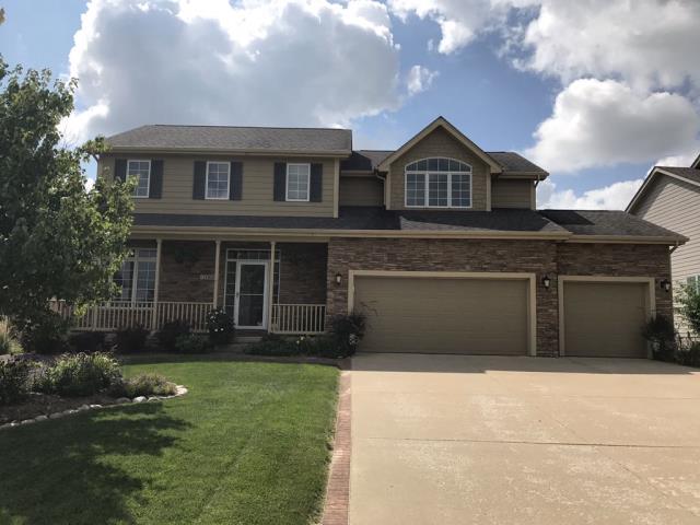 We completed a comprehensive roofing overhaul in Urbandale, IA, replacing all old shingles and installing new gutters. The job included removing debris, ensuring proper drainage, and enhancing the home's curb appeal.