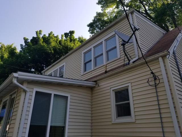 We completely replaced the roof on both the home and garage in West Des Moines, IA, installing high-quality materials for lasting durability and protection.