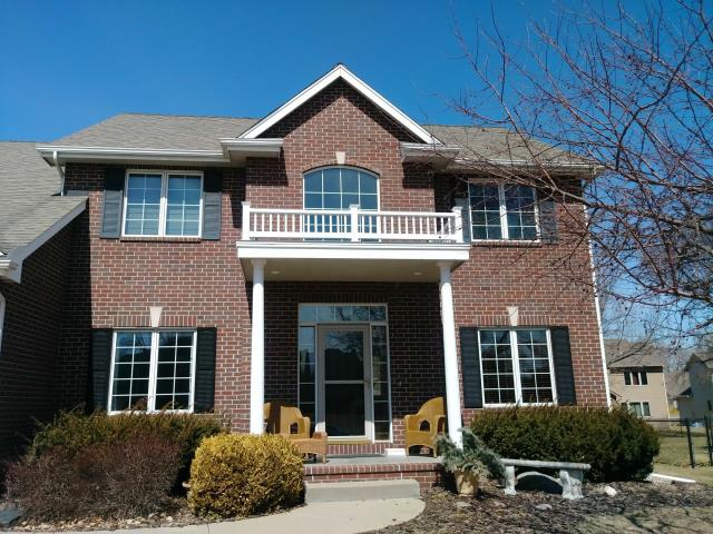 On this home in Johnston, IA, we completely replaced the old roofing and gutters, providing a fresh, durable finish with improved protection and curb appeal.