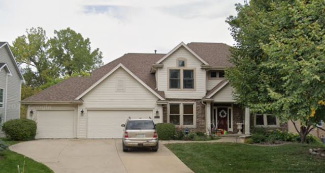 On this home in Johnston, IA, we removed the old roofing and installed a new, high-quality roof along with new gutters for improved protection and efficient water drainage.