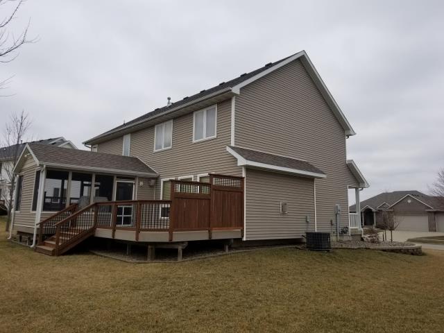 On this home in Johnston, IA, we replaced the roof and gutters and repaired the siding, providing improved protection, proper drainage, and a refreshed exterior appearance.