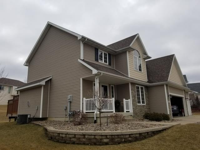 On this home in Johnston, IA, we replaced the roof and gutters and repaired the siding, providing improved protection, proper drainage, and a refreshed exterior appearance.