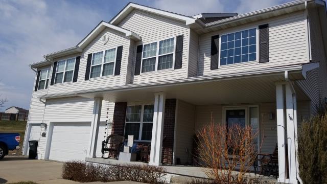 On this home in Johnston, IA, we completed a full roof replacement using high-quality materials and repaired damaged sections of the gutters, providing a durable, seamless finish and lasting protection. 