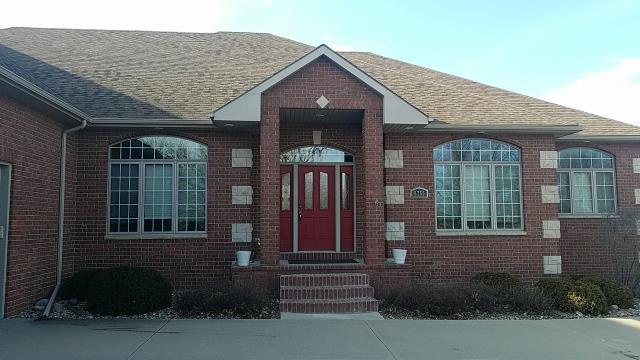 For this home in Johnston, IA, we installed a brand-new roof and completed repairs to the gutters, siding, and fascia, leaving the exterior refreshed and well-protected.