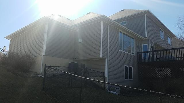 On this home in Johnston, IA, we completed a full roof replacement, removing the old shingles and installing new ones. We also replaced the gutters to improve drainage and help protect the home from water damage.