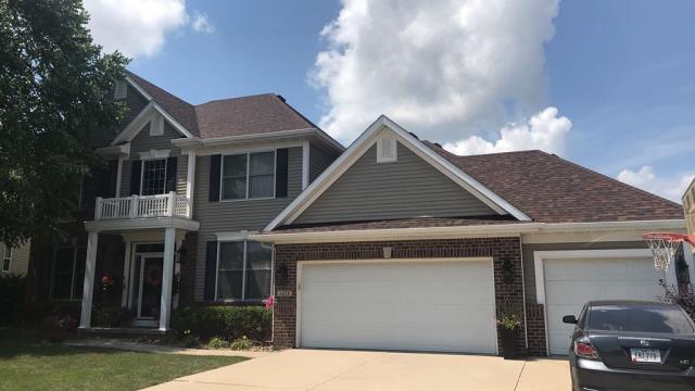 In Johnston, IA, we completed a full roof and gutter replacement and repaired damaged siding, improving the home’s protection, drainage, and overall appearance.