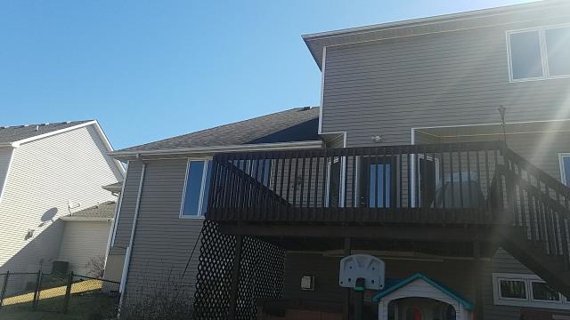 In Johnston, IA, we completed a full roof and gutter replacement and repaired damaged siding, improving the home’s protection, drainage, and overall appearance.
