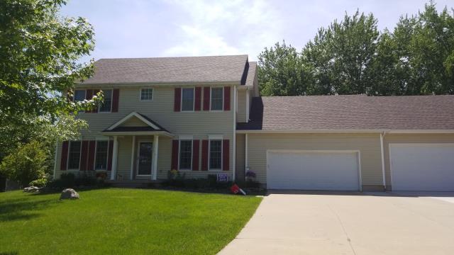 We completed a full roof replacement on this Johnston, IA home, installing quality materials to ensure long-lasting durability and protection.