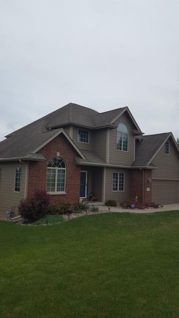 We completed a full roof replacement on this Johnston, IA home, providing lasting protection with a durable, high-quality finish.