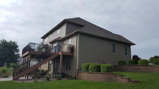 We completed a full roof replacement on this Johnston, IA home, providing lasting protection with a durable, high-quality finish.