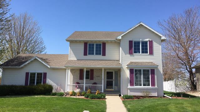 We repaired the siding, replaced the shutters, and installed a brand-new roof on this Ames, IA home, enhancing its durability, protection, and overall curb appeal.