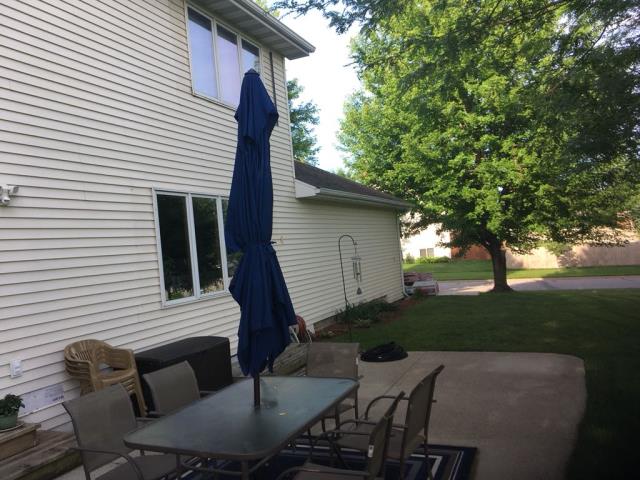 We repaired the siding, replaced the shutters, and installed a brand-new roof on this Ames, IA home, enhancing its durability, protection, and overall curb appeal.