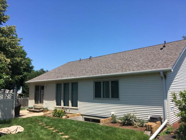 We replaced the entire roof, repaired the siding, and installed gutter guards on this Ames, IA home to enhance its protection and curb appeal.