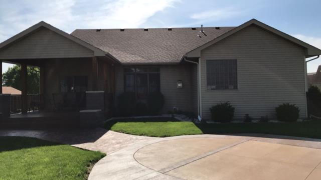 We meticulously removed the old roofing and installed a new, high-quality roof on this Urbandale, IA home, including proper ventilation to ensure long-lasting durability and efficiency.