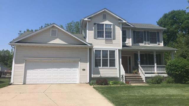 We completed siding repairs and a full roof replacement on this Urbandale, IA home, restoring minor damage and providing long-lasting protection with a clean, polished finish.
