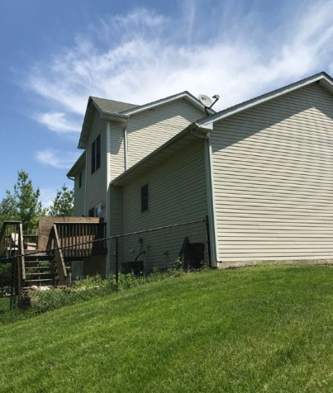 We completed siding repairs and a full roof replacement on this Urbandale, IA home, restoring minor damage and providing long-lasting protection with a clean, polished finish.