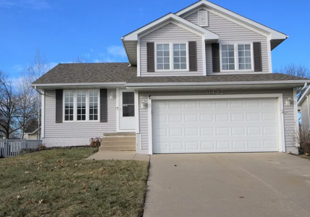 We meticulously removed the old roofing and installed a new, high-quality roof on this Johnston, IA home. The project was completed efficiently, ensuring lasting durability and protection.