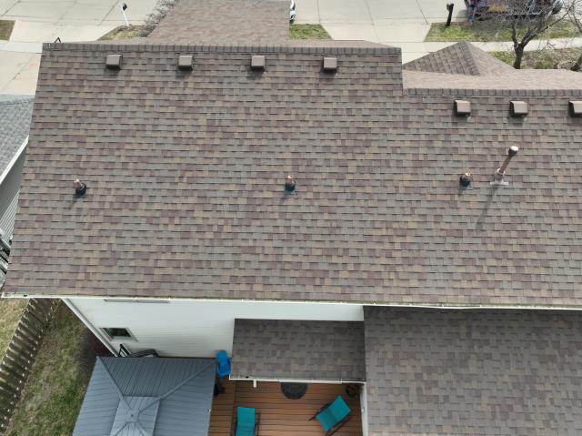 We completed a full roof replacement on this Urbandale, IA home, installing new, high-quality shingles to enhance durability and curb appeal.