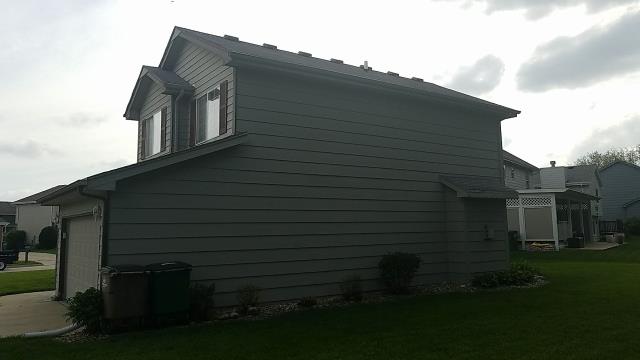 We completed a full roof replacement on this West Des Moines, IA home, installing high-quality shingles to provide lasting durability and protection.