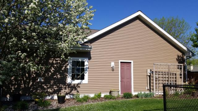 Our team installed a new roof and gutters on this Ames, IA home, providing lasting protection and improved water drainage.