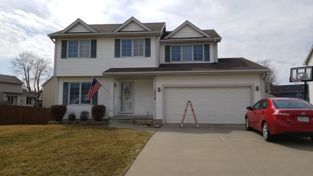 We removed the existing roofing and installed high-quality materials on this Urbandale, IA home, enhancing its durability and curb appeal while ensuring a clean, professional finish.
