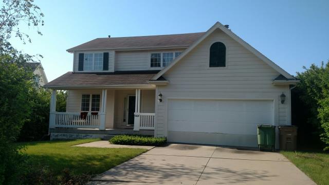 We completed a full roof replacement and installed new gutters on this West Des Moines, IA home, improving water drainage while enhancing its durability and curb appeal.