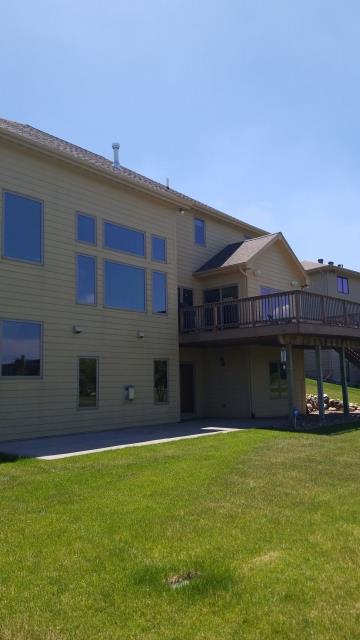 We removed the existing roofing and installed a new, high-quality roof on this Johnston, IA home, providing a durable and weather-resistant finish.
