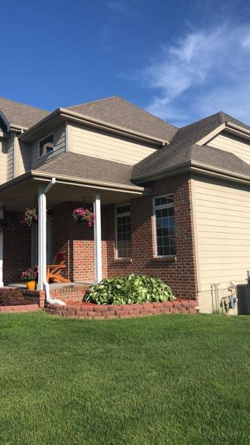 We completed a full roof and gutter replacement on this Urbandale, IA home, installing quality materials to enhance weather protection and improve water drainage.