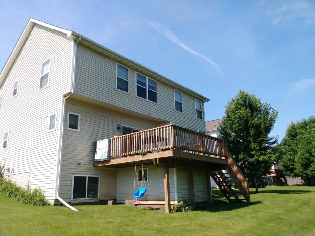 This Urbandale, IA home received a complete roof replacement along with new gutters, providing reliable protection and improved drainage while enhancing the home's overall appearance.