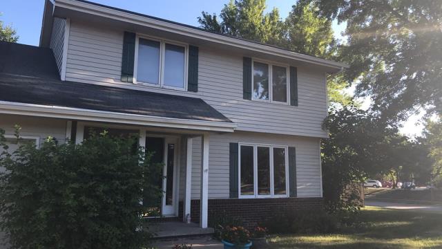 We upgraded this West Des Moines, IA home with new shingles, a watertight roof, and repaired, cleaned gutters to improve drainage and help protect the home from water damage.