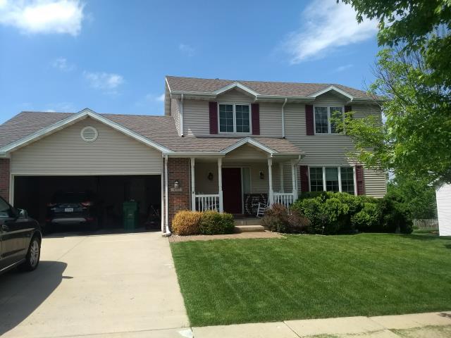 We updated this Ames, IA home with a new roof, siding, and windows, giving the exterior a refreshed appearance while improving overall protection and energy efficiency.
