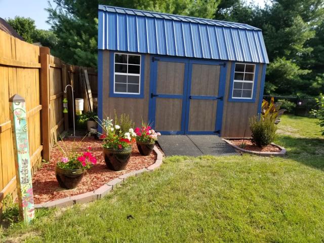 Our team replaced the roofs on both the home and shed in Ames, IA, installing new shingles with careful attention to detail to ensure a clean finish and lasting protection against the elements.